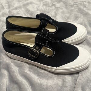 Vans Black and White Sneakers (women shoes) size 10. Never worn without tags/box